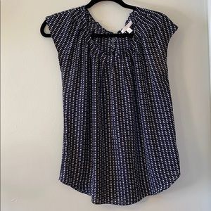 Dressy patterned sleeveless shirt